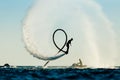 Silhouette of a fly board rider