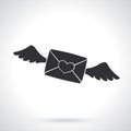 Silhouette of flying closed envelope with wax heart and wings