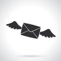 Silhouette of flying closed envelope with wings