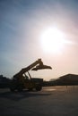 Silhouette of Forklift trucks container handlers.