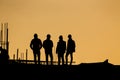 Silhouette of engineers at construction site Royalty Free Stock Photo