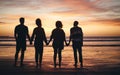 Silhouette, friends and beach sunset holding hands in freedom, support and calm peace in nature together. Back shadow