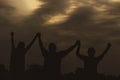 Silhouette of friends with hands up chilling enjoying funshun Friendship day special Royalty Free Stock Photo