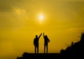 Silhouette friends pointing with finger in sun Royalty Free Stock Photo