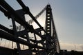 Silhouette of the front part of the large boat at sunset