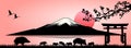 Family of wild boars on the background of Mount Fuji