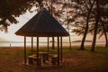 Silhouette of a gazebo in the Park on the background of the sea in the evening. Malaysia. Kota Kinabalu