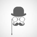 Silhouette of gentleman's face with twisted moustache, bowler and glasses