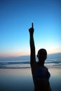 Silhouette of a girl on a background of the sea