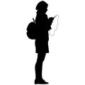 Silhouette of girl with backpack and phone Royalty Free Stock Photo