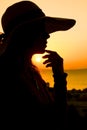 Silhouette of a girl on a chair on a nature background Royalty Free Stock Photo