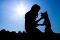 Silhouette of Girl With Dog in Morning Sunrise Royalty Free Stock Photo