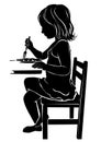 Silhouette girl eats