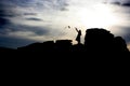 Silhouette of girl flying kite Royalty Free Stock Photo