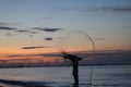 Silhouette hair flick at sunset