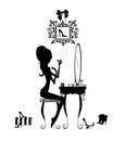 Silhouette of a Girl at her Vanity Royalty Free Stock Photo