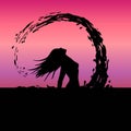 Silhouette of a girl with long hair. head sweep and splashing seawater