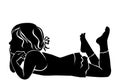 Silhouette girl lying down looking Royalty Free Stock Photo