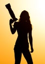 Silhouette of a girl photographer at sunset Royalty Free Stock Photo