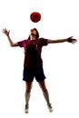 Silhouette of girl playing football Royalty Free Stock Photo