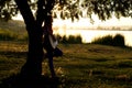 silhouette of a girl playing a guitar Royalty Free Stock Photo