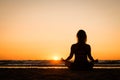 Silhouette of a girl practicing yoga Royalty Free Stock Photo