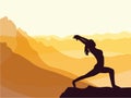 Silhouette of girl practising yoga. Mountains in the background. Sunrise, yoga sun salutation.