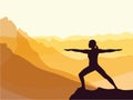 Silhouette of girl practising yoga. Mountains in the background. Sunrise, yoga sun salutation.