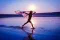 Silhouette of girl running on the beach Royalty Free Stock Photo