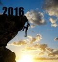 Silhouette girls climbs into the New Year 2016.