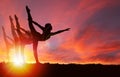 Silhouette Girls Dancing at Golden Sunrise