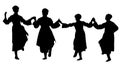 Silhouette of a girls dancing - Serbian folklore Royalty Free Stock Photo