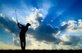 Silhouette golfer playing golf at beautiful sunset Royalty Free Stock Photo