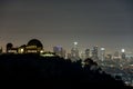 Silhouette of Griffith Observatory and the night lights of downtown Los Angeles Royalty Free Stock Photo