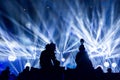 Silhouette of a group of cameramen broadcasting an event.