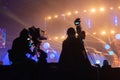 Silhouette of a group of cameramen broadcasting an event