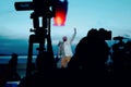 Silhouette group of cameramen at an event