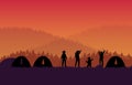 Silhouette group hiker traveller or trekker and tent on orange gradient background Royalty Free Stock Photo