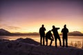 Silhouette of a group over a Winter Landscape Royalty Free Stock Photo