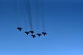 Silhouette of a group of Russian fighter aircraft against a blue sky. Six Russian fighter aircraft Royalty Free Stock Photo
