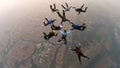 Silhouette of a group of skydivers jumping at the end of the day. Royalty Free Stock Photo