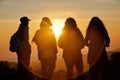 Silhouette group traveler see view sunset on the mountain in moment of happiness.feel relax lifestyle.