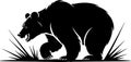 Silhouette of a Growling Bear in Tall Grass Royalty Free Stock Photo