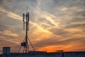 Silhouette of GSM transmitters on the roof office building Royalty Free Stock Photo