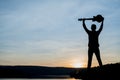 Silhouette of guitar player on stone Royalty Free Stock Photo