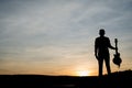 Silhouette of guitar player on stone Royalty Free Stock Photo