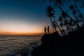 Silhouette couple in love on the seafront among palm trees Royalty Free Stock Photo