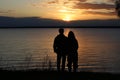 Romantic couple at sunset. Royalty Free Stock Photo