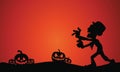Silhouette of Halloween zombie and pumpkins Royalty Free Stock Photo