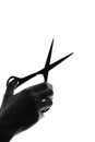 Silhouette hand with cutting scissors Royalty Free Stock Photo